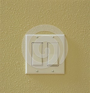 Contemporary modern electric light switches on wall. House home utilities interior details elements