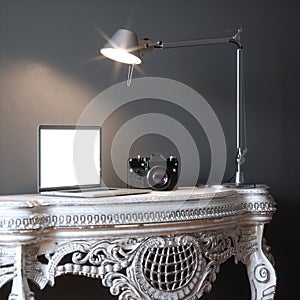 Contemporary office place with laptop, camera and lamp 3d render