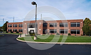 Contemporary Red Brick Building with Lamplight