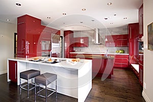 Contemporary red modern kitchen with 2 different island