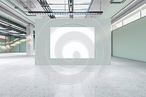 Contemporary spacious concrete warehouse garage interior with empty white mock up poster. Space and design concept.