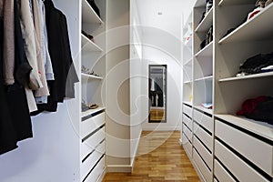 Contemporary walk in wardrobe