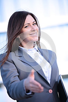 Contemporary young couple get financial advise and shaking hands. photo