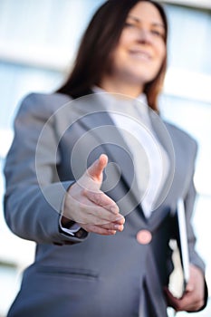 Contemporary young couple get financial advise and shaking hands. photo