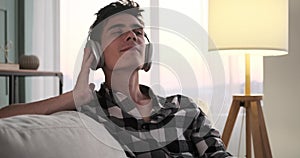 Content Caucasian Man in Headphones Enjoying Music