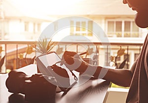 Content Creator work at home and using tablet computer