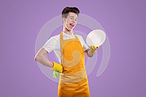 Content housekeeper with plate winking on violet background