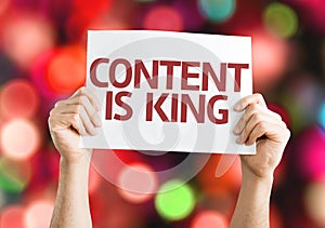 Content is King card with colorful background with defocused lights