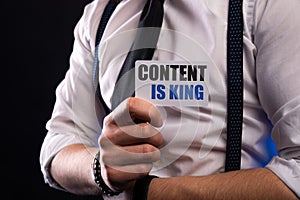 Content is King words on white card in hand