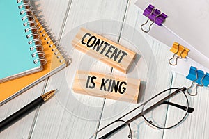 CONTENT IS KING - words written on wooden blocks