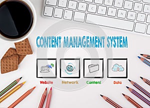 Content Management System Concept. White office desk