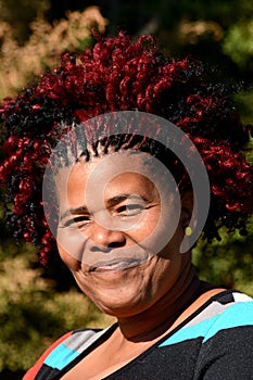 Content smiling South African Xhosa woman