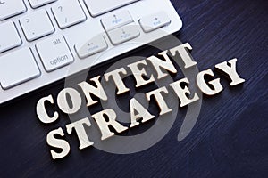 Content strategy from small letters and keyboard. SEO concept