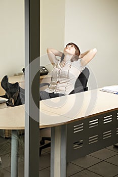 Contented woman in office