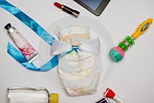 Contents of a woman`s bag on white background.