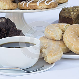 Continental breakfast buffet table setting with coffee and pastries