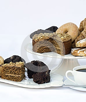 Continental breakfast buffet table setting with coffee and pastries