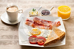 Continental breakfast with coffee and orange juice.