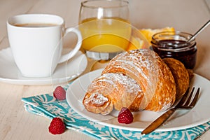 Continental breakfast with croissant