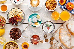 Continental breakfast menu on woden table