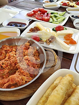 Continental breakfast menu on woden table.