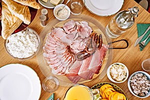 Continental breakfast on wooden table