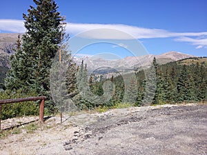 Continental divide colorado rocky mountains blue spruce trees clear skies snow capped mountains