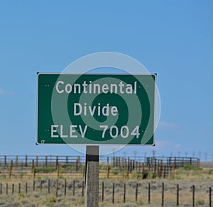 The Continental Divide sign also known as Western Divide in the Rocky Mountains of Wyoming