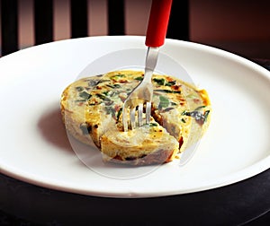 Continental omlette on white plate