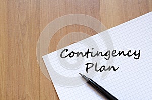 Contingency plan write on notebook