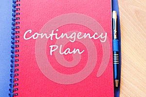 Contingency plan write on notebook