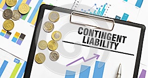 CONTINGENT LIABILITY on paper sheet with coins and charts photo