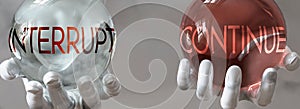 Continue and interrupt in a balanced life - pictured as words continue,interrupt in hands to show that interrupt and continue photo