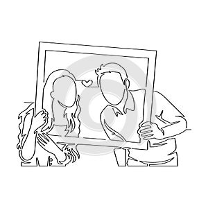 Continuous line art drawing of couple holding picture frame
