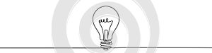 Continuous line drawing of light bulb. Single line electric lamp icon.