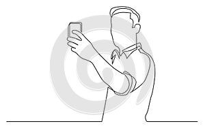 Continuous line drawing of standing man making selfie with his mobile phone