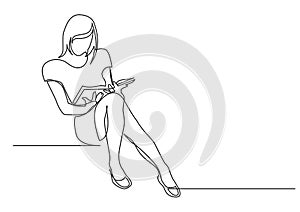 Continuous line drawing of young woman sitting reading book