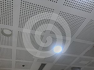 An Continuous Metallic Grid ceiling design view or metallic false ceiling images of an office building roof decoration