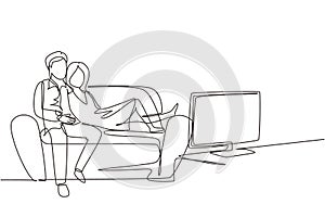 Continuous one line drawing couple watching TV together sitting on sofa. Happy man and woman relaxing in living room. Romantic