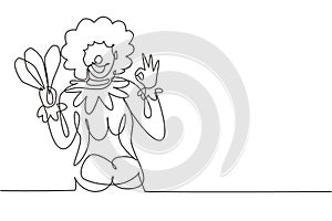 Continuous one line drawing female clown with gesture okay, wearing wig and smiling face makeup, entertaining kids at birthday