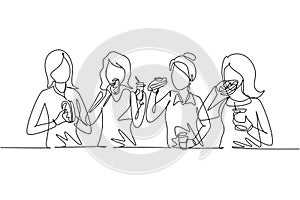Continuous one line drawing friends eating fast food meal in restaurant. Group of happy women sitting, talking, dinner, burgers