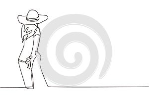 Continuous one line drawing girl leads guy's hand. Take my hand. Woman with summer hat walking on romantic honeymoon