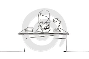 Continuous one line drawing girl studying on table with study lamp and pile of books. Kid makes homework from school. Intelligent