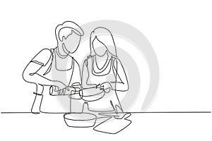 Continuous one line drawing happy romantic couple pour oil into pan which is being held by one of them. Cooking preparation in