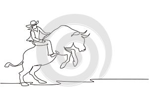 Continuous one line drawing strong and brave cowboy in hat participates in rodeo riding wild bull. Cowboy riding wild bull.