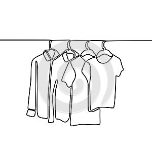 Continuous one line drawing of sweater, shirt, and t-shirt hanging on clothing rack. Minimalistic style of fashionable wardrobe