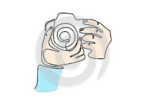 Continuous one line drawing of taking picture with dslr camera