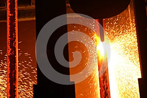 Continuous steel bloom casting machine.