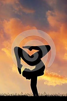 Contortionist at sunset