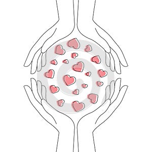 A contour image of the hands surrounds an armful of hearts. photo